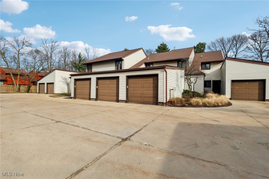 3484 Mayfield Road, Unit 3426 Cleveland Heights, OH 44118 - Photo 2 of 33 View of front of property featuring driveway and a garage