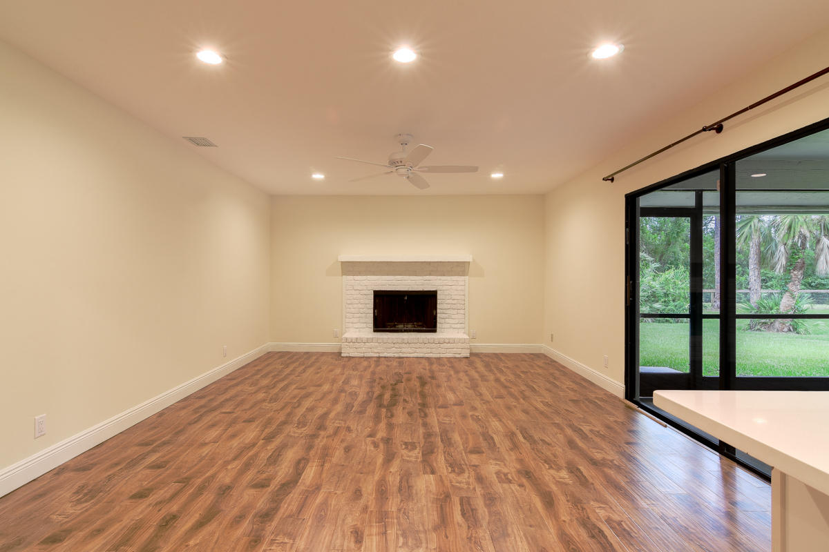12225 154th Road North Jupiter, FL 33478 - Photo 17 of 39 Family Room Fireplace
