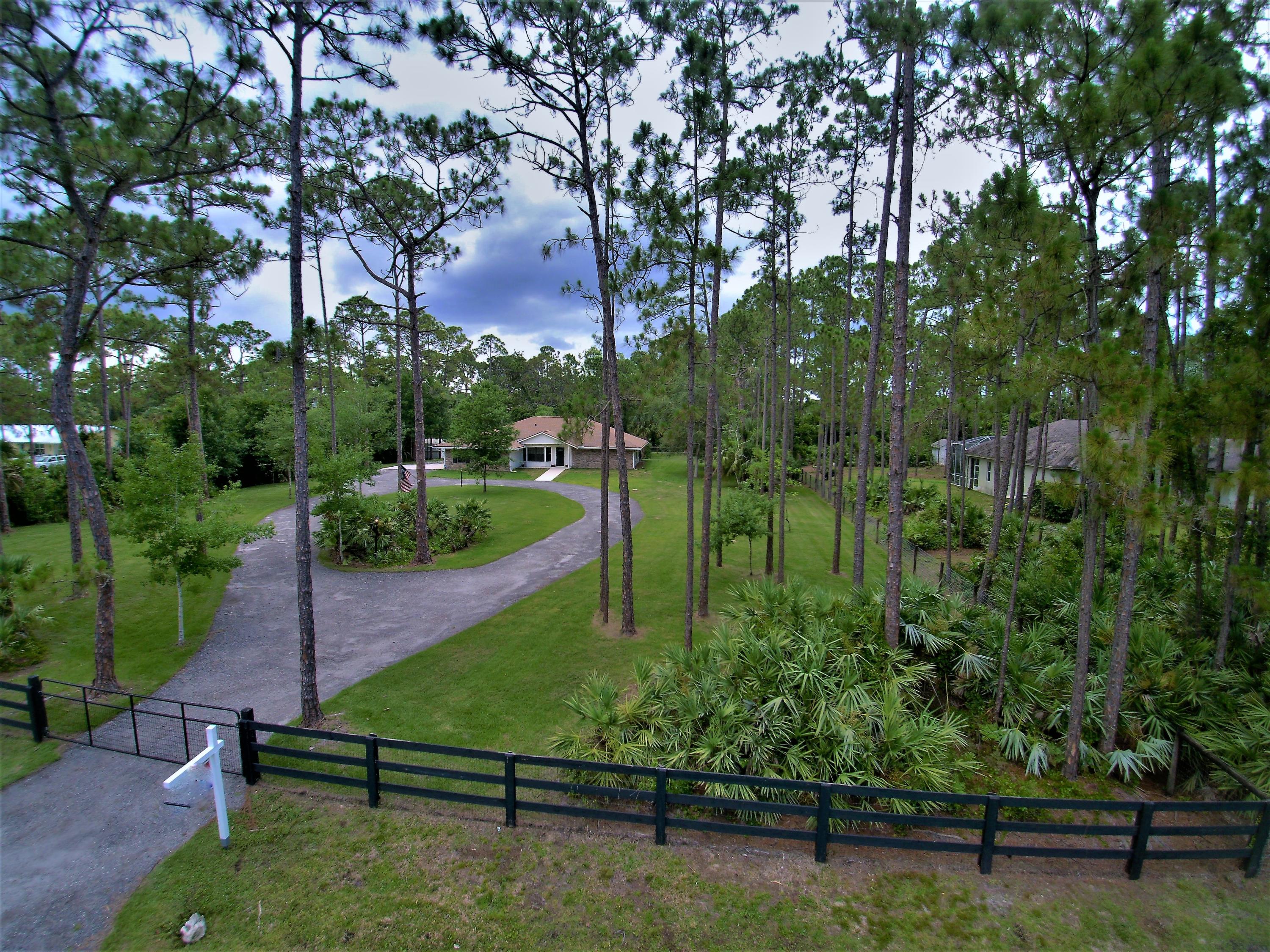 12225 154th Road North Jupiter, FL 33478 - Photo 5 of 39 Aerial Front Gate