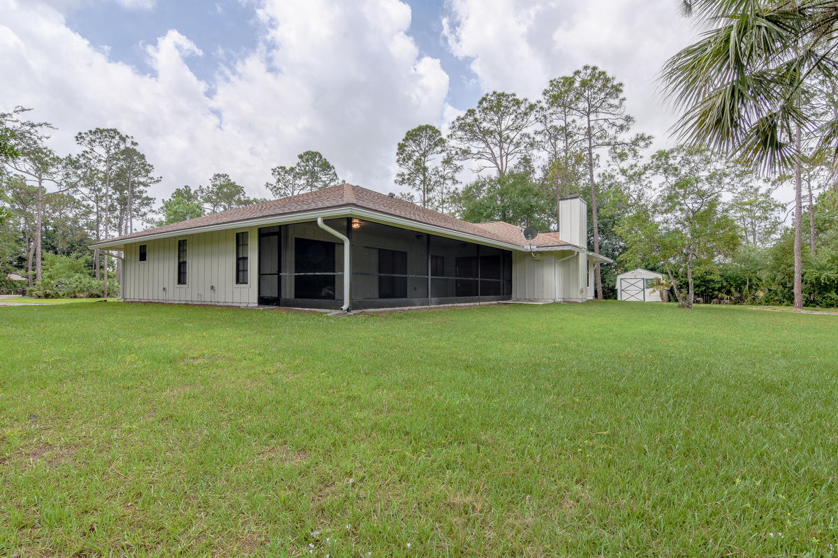 12225 154th Road North Jupiter, FL 33478 - Photo 8 of 39 Screened Patio/Chimney