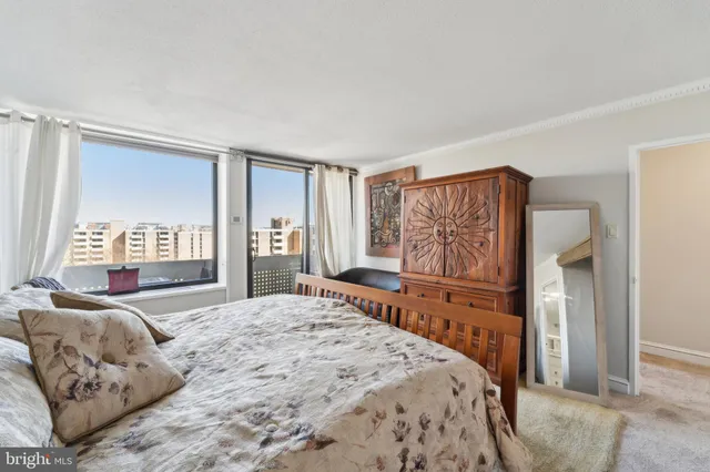 a kitchen with a refrigerator and a sink