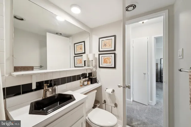 a bed room with a bed and a window