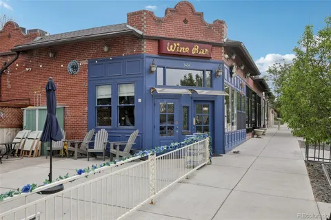 a view of a building with sitting area