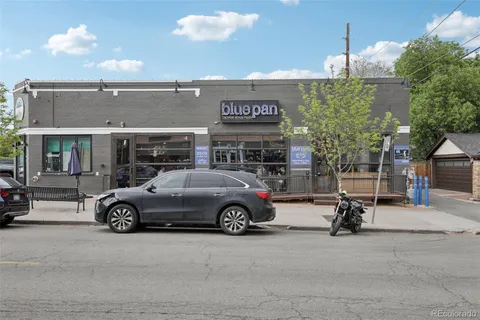 a car parked in front of a building
