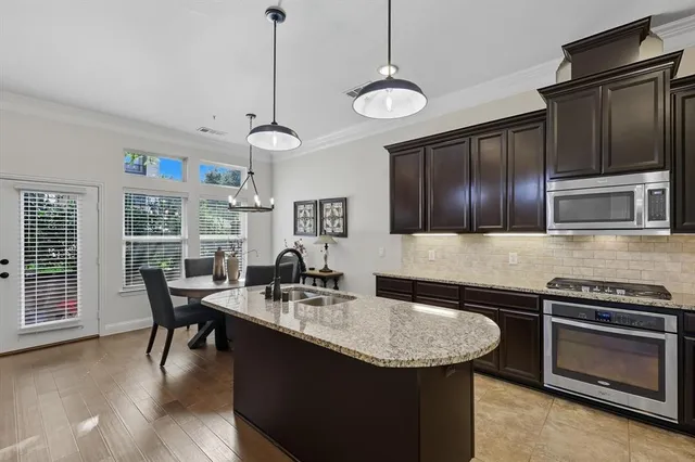 a bathroom with a sink vanity and a mirror