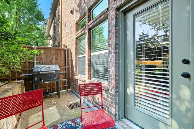 a view of a patio with swimming pool