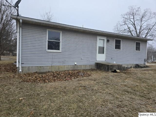 219 South 1st Street Carthage, IL 62321 - Photo 19 of 23 a view of a house with a yard