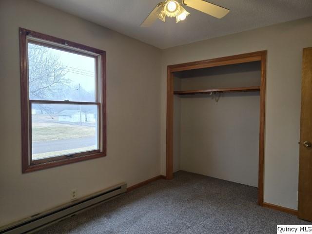 219 South 1st Street Carthage, IL 62321 - Photo 9 of 23 a view of an empty room with a window