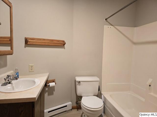 219 South 1st Street Carthage, IL 62321 - Photo 10 of 23 a white toilet sitting next to a bathroom sink