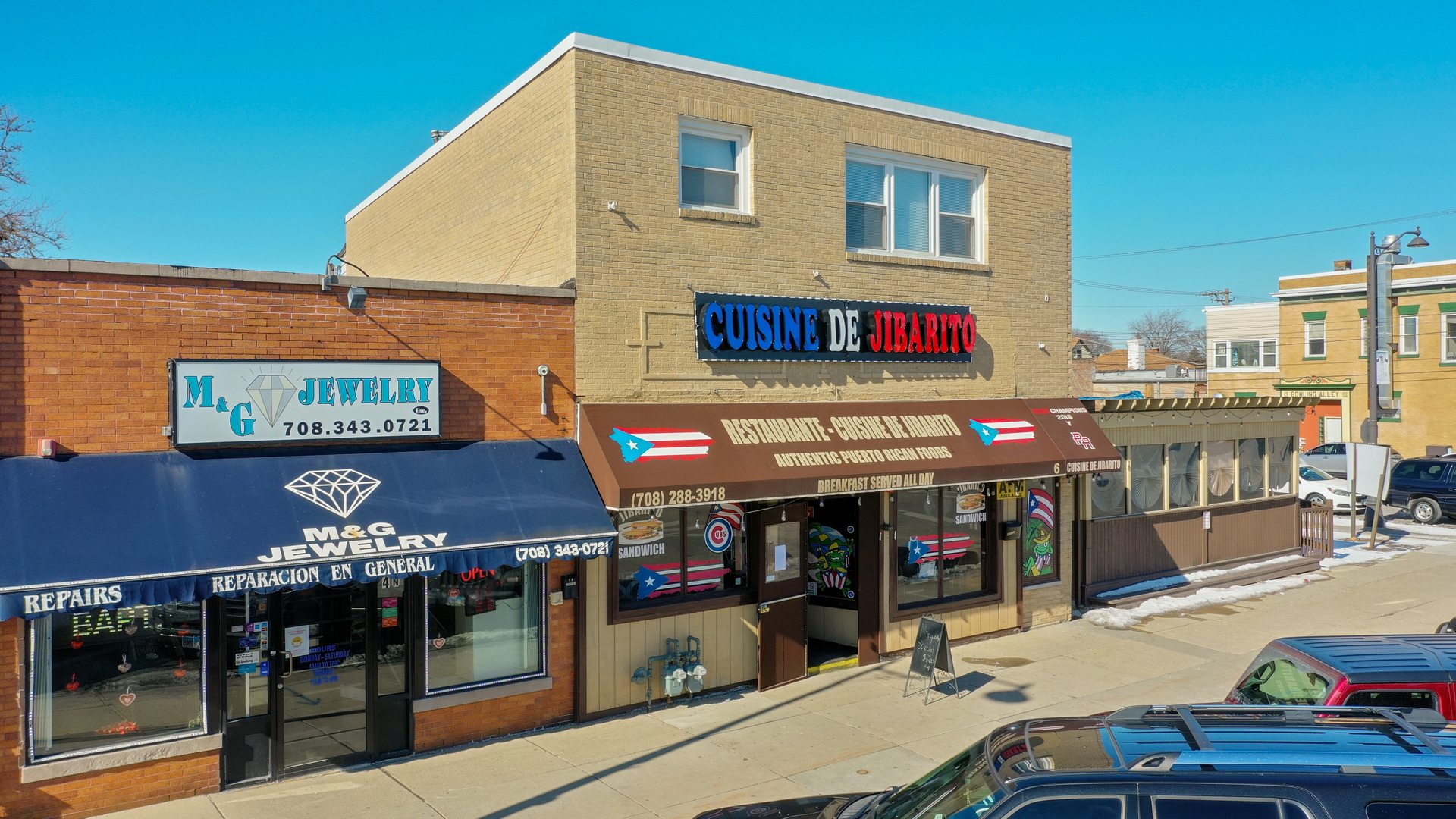 a view of people sitting in front of retail shop