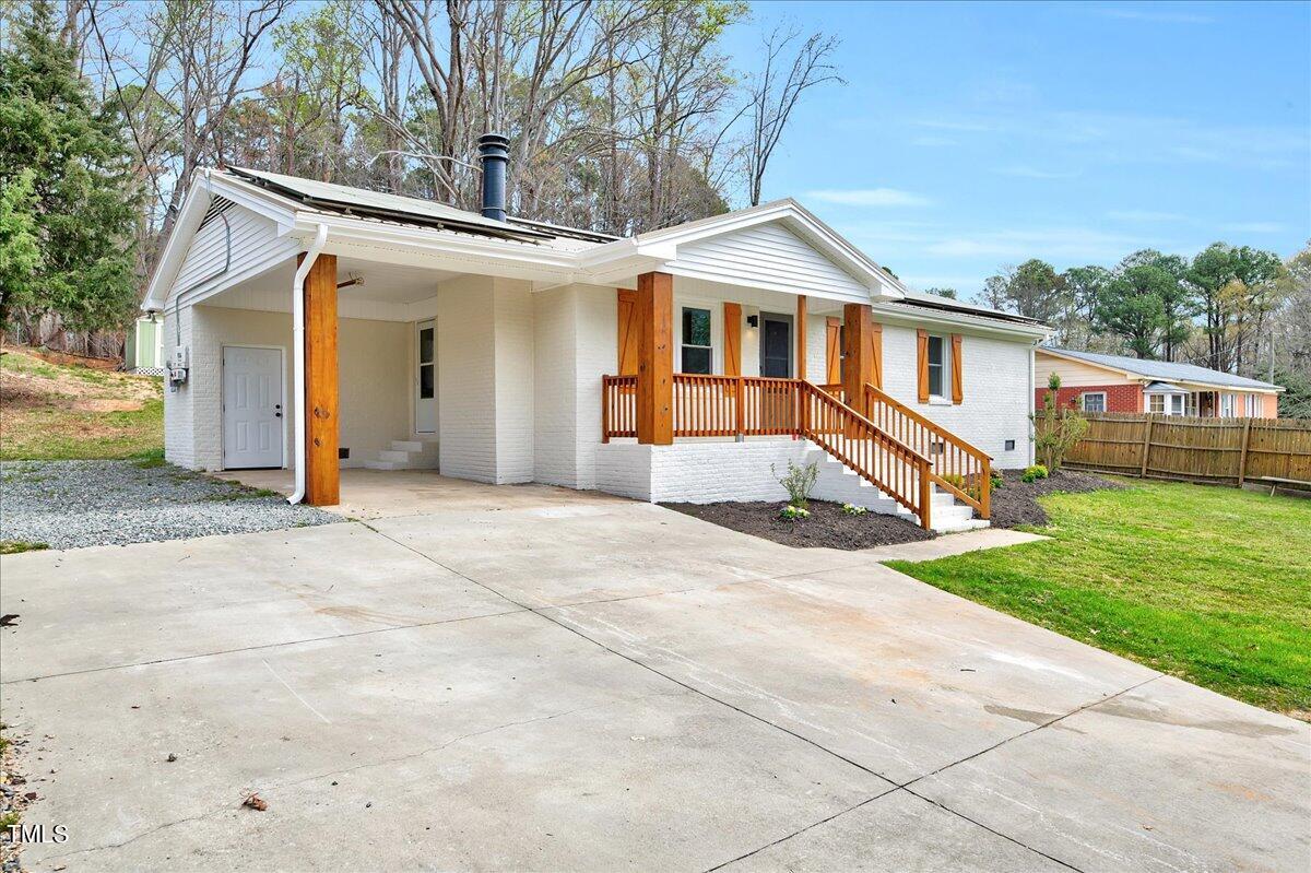 2808 Oak Ridge Court Raleigh, NC 27603 - Photo 4 of 43 a view of a house with a yard