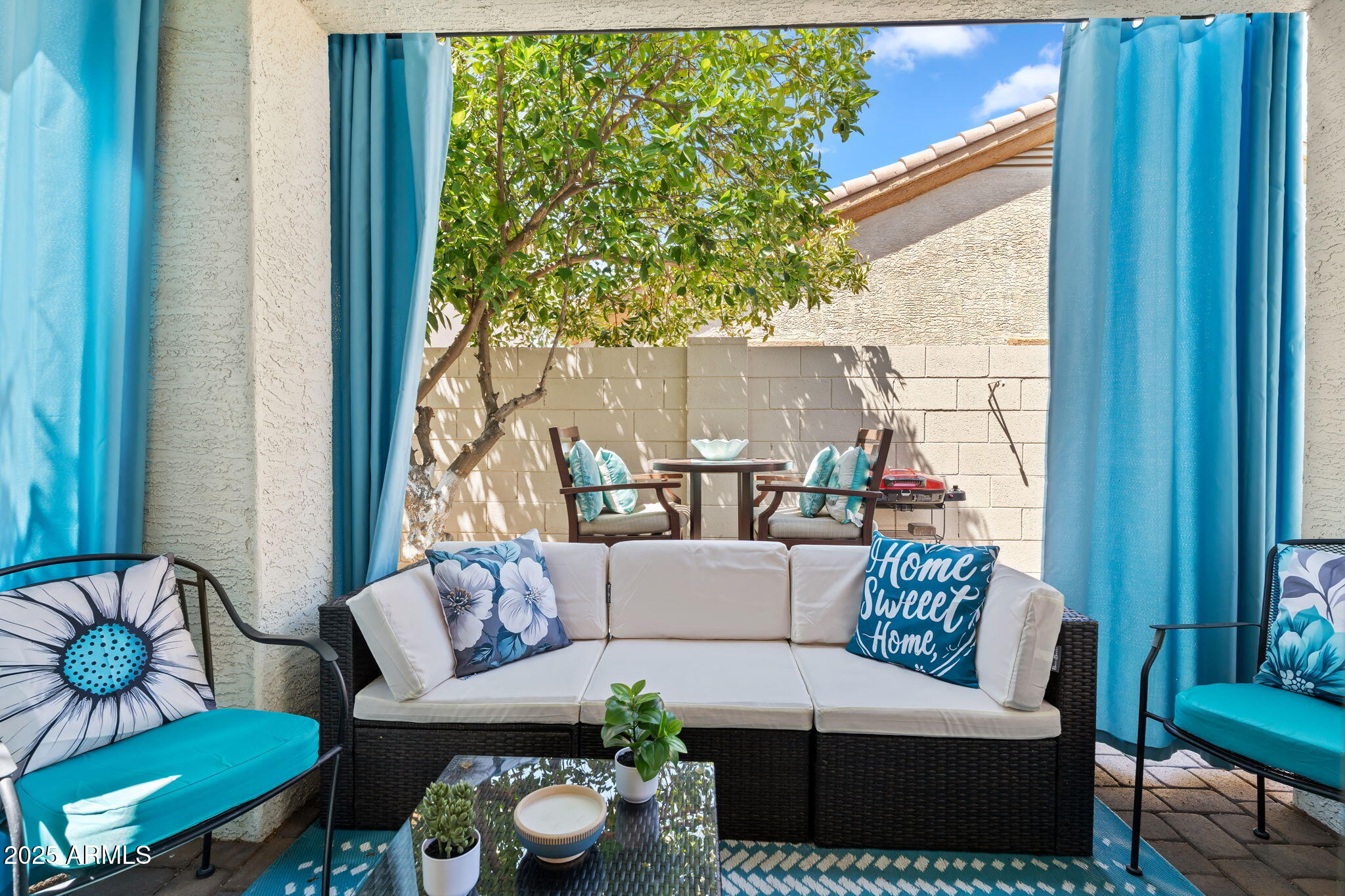 4169 East Hallihan Drive Cave Creek, AZ 85331 - Photo 2 of 13 a living room with furniture and a window