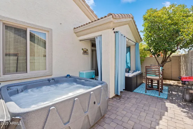 a view of house with outdoor seating space
