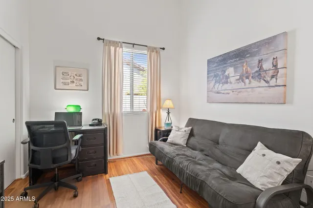 a living room with furniture and a window