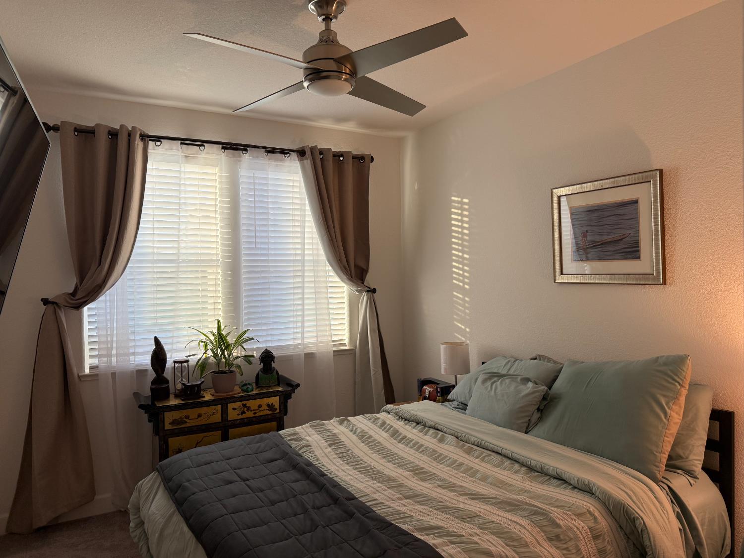 461 Walcott Street Manteca, CA 95336 - Photo 21 of 24 a bedroom with a bed and wooden floor