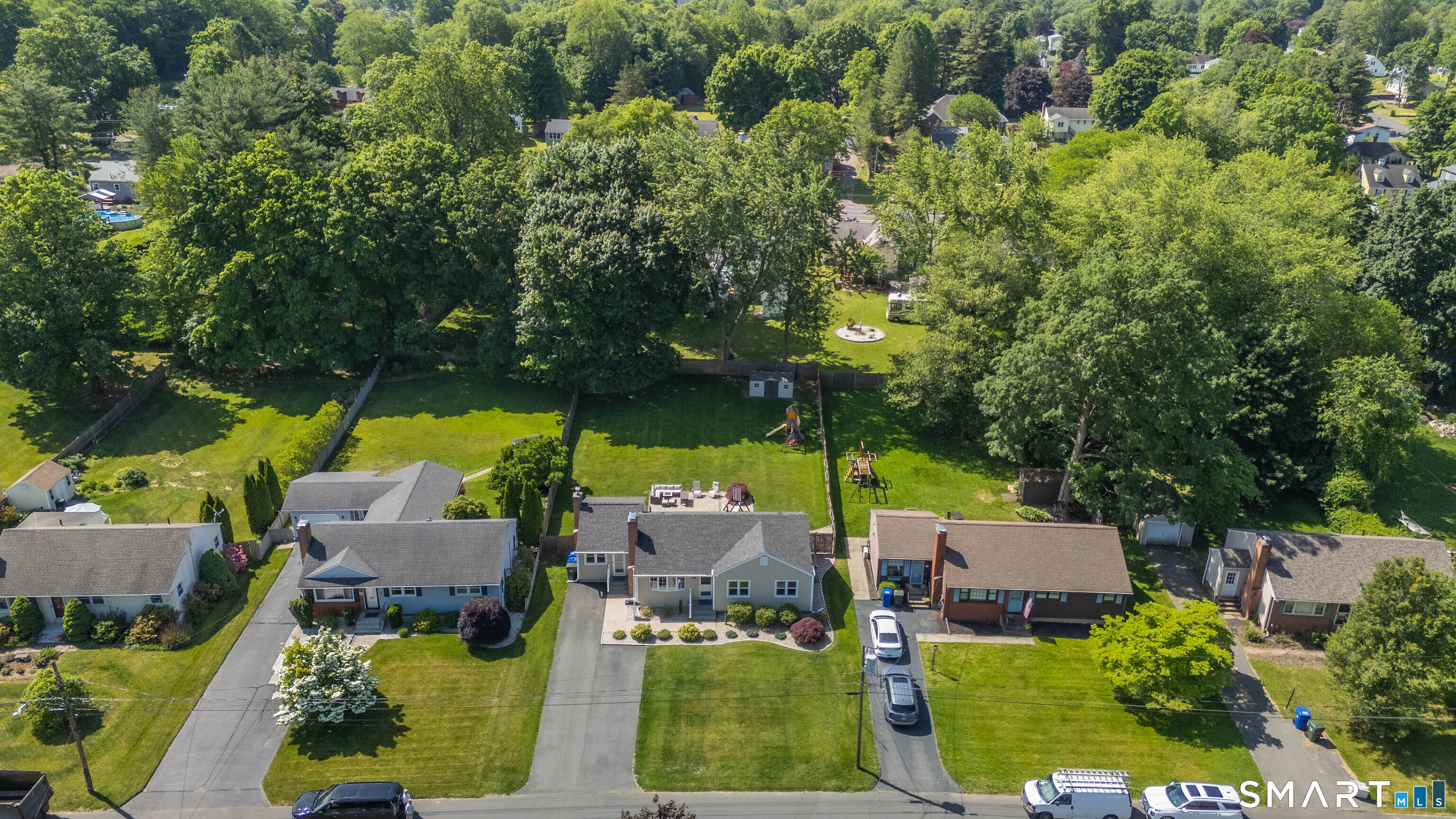 87 Lydall Road Newington, CT 06111 - Photo 34 of 35 an aerial view of a house with yard swimming pool and outdoor seating
