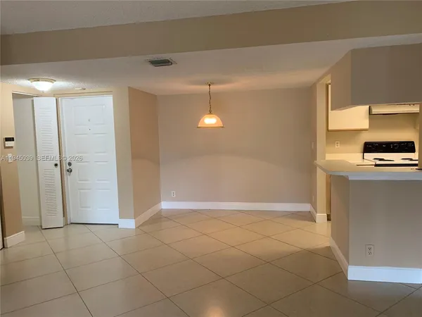 a view of a kitchen with a sink
