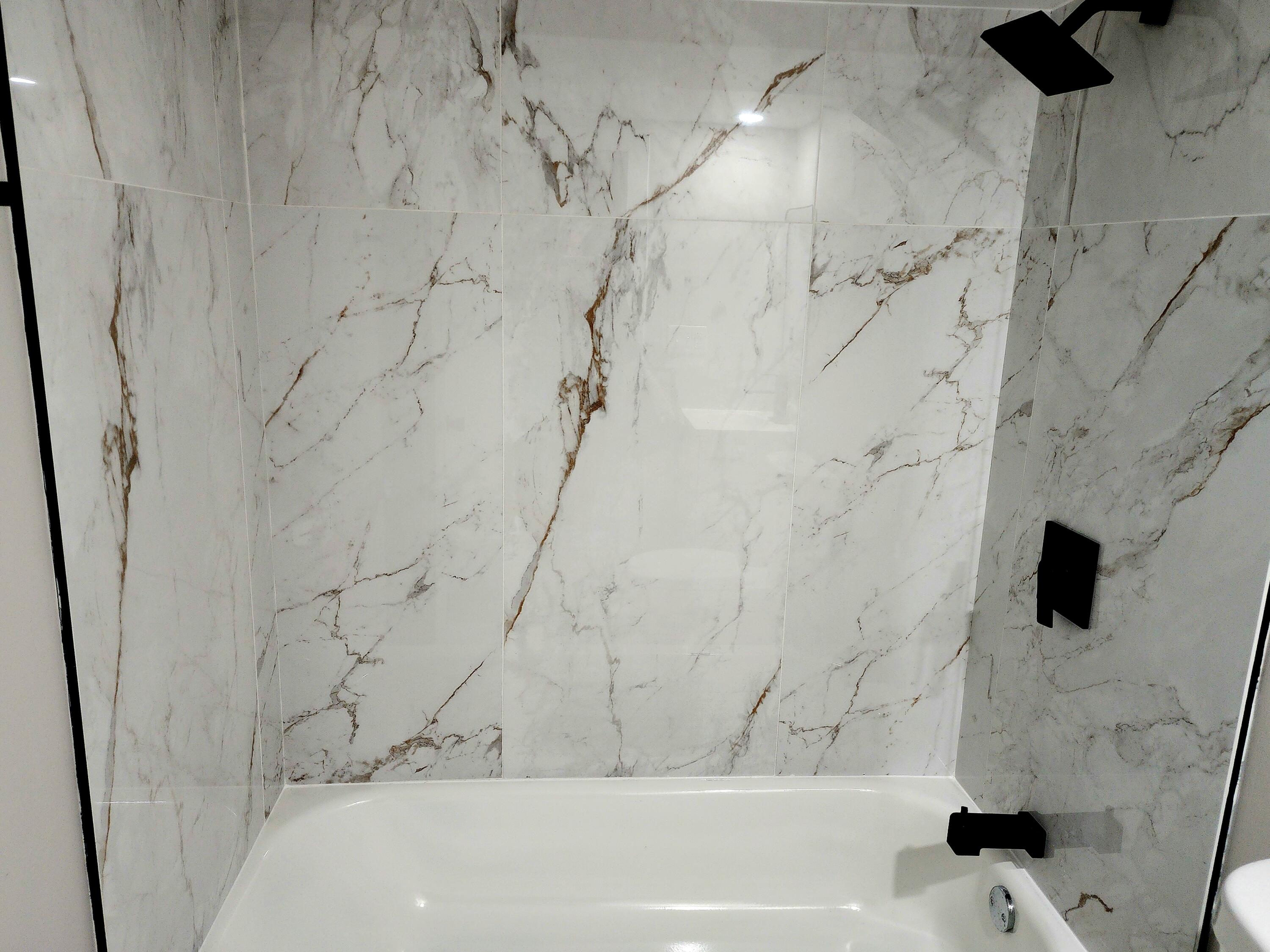 418 Taft Street Gary, IN 46404 - Photo 18 of 18 a bathroom with a bathtub