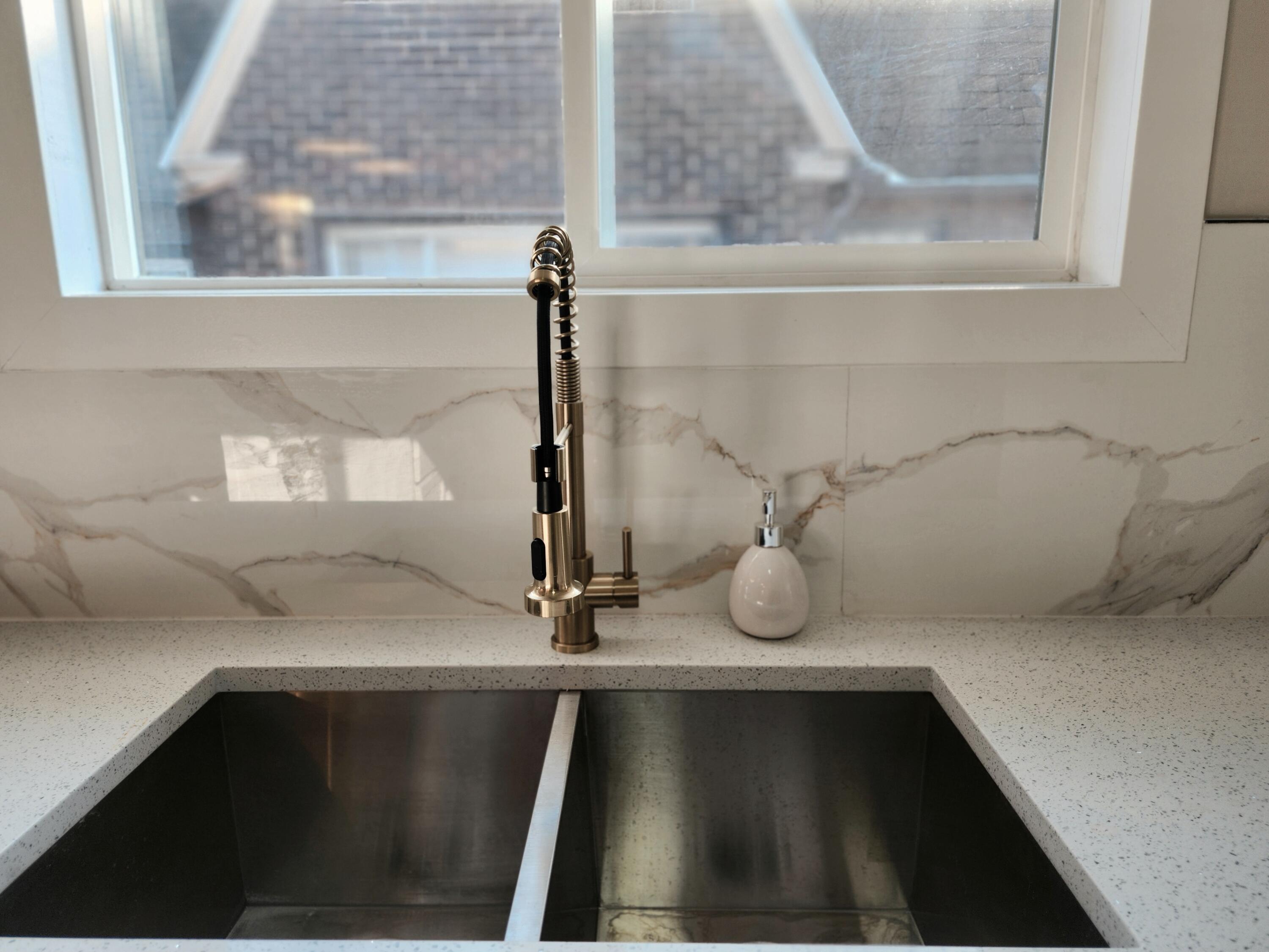 418 Taft Street Gary, IN 46404 - Photo 10 of 18 a close view of sink and tap