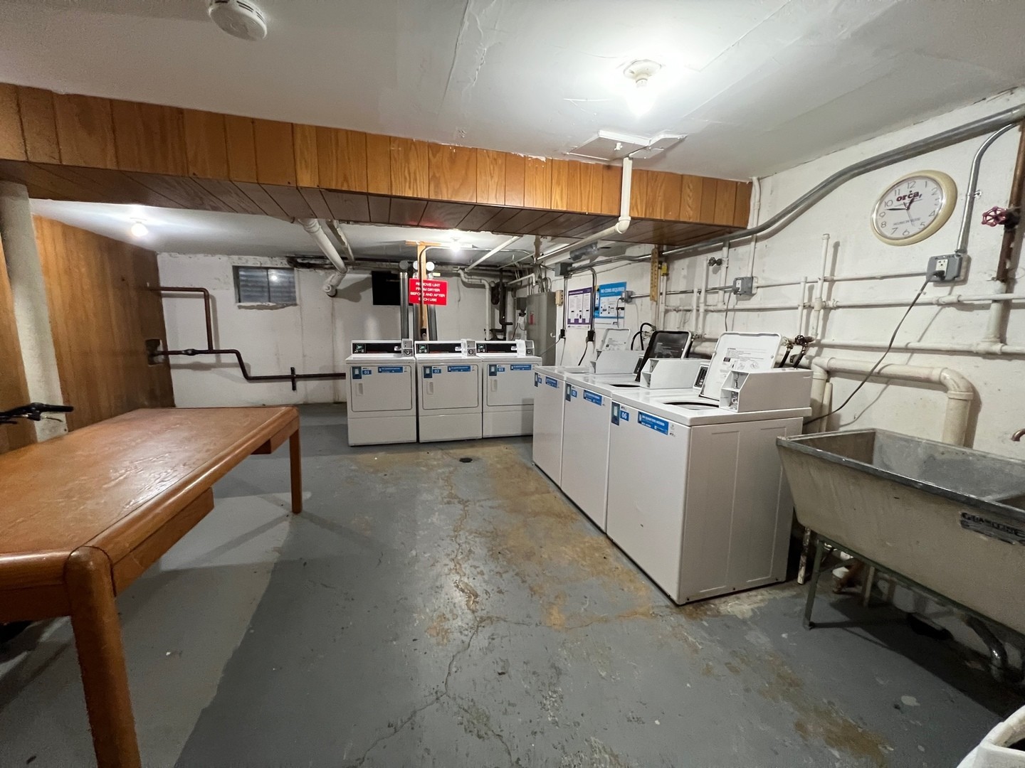 850 South Lorraine Road, Unit 3L Wheaton, IL 60189 - Photo 17 of 19 a kitchen that has a lot of cabinets in it
