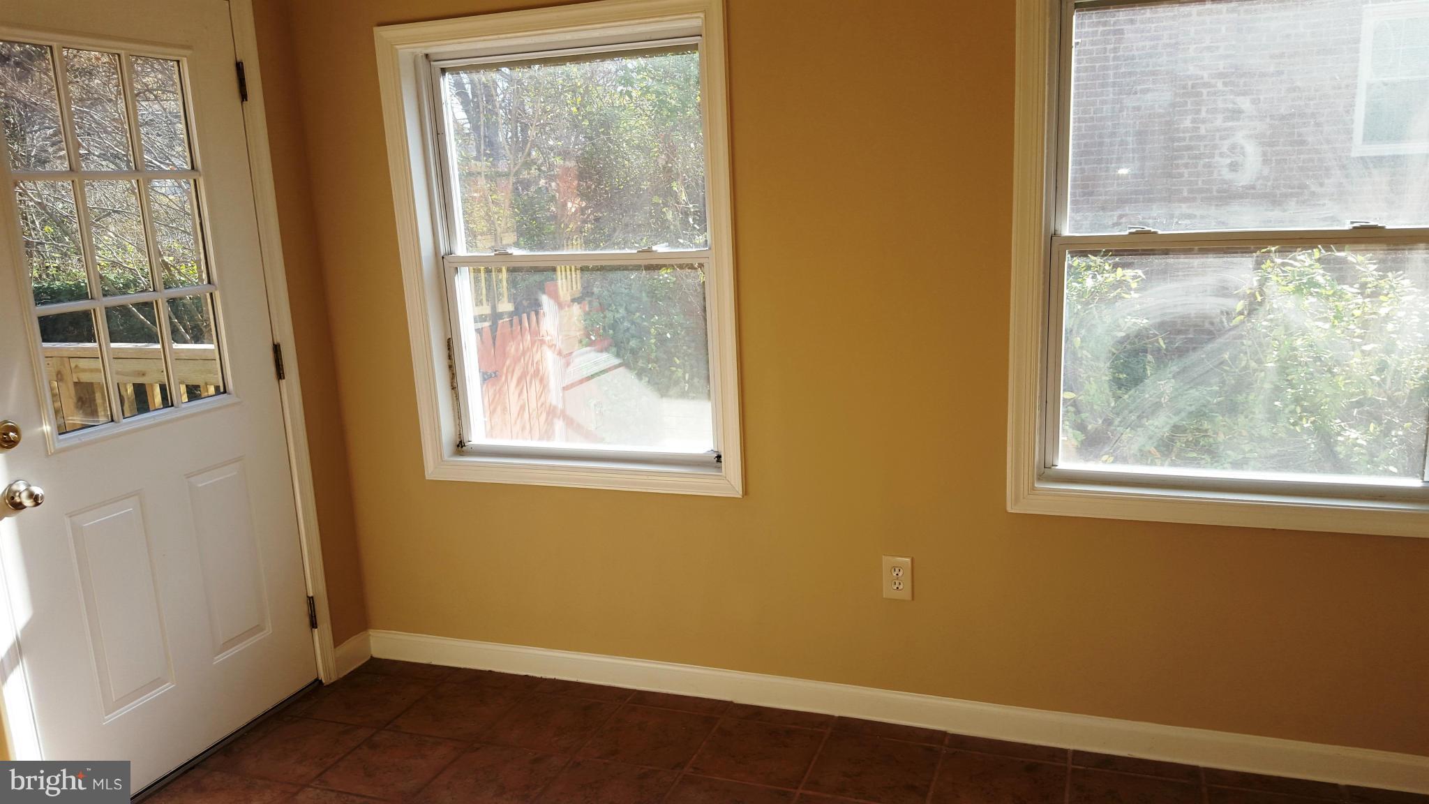 9011 Eton Road Silver Spring, MD 20901 - Photo 5 of 13 a view of a room that has a window in it