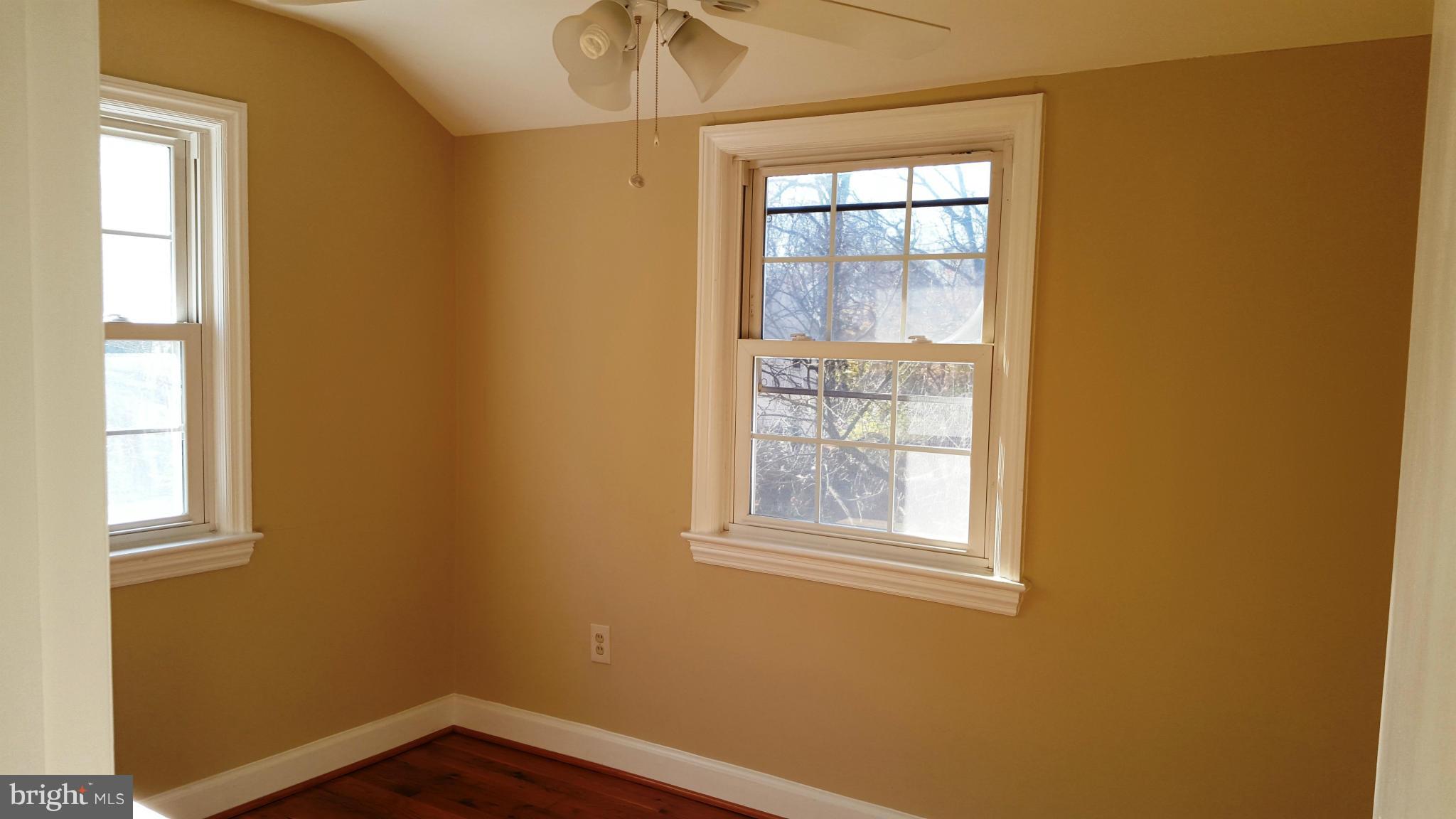 9011 Eton Road Silver Spring, MD 20901 - Photo 6 of 13 a view of an empty room with a window