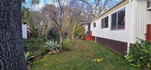 a view of a back yard of the house