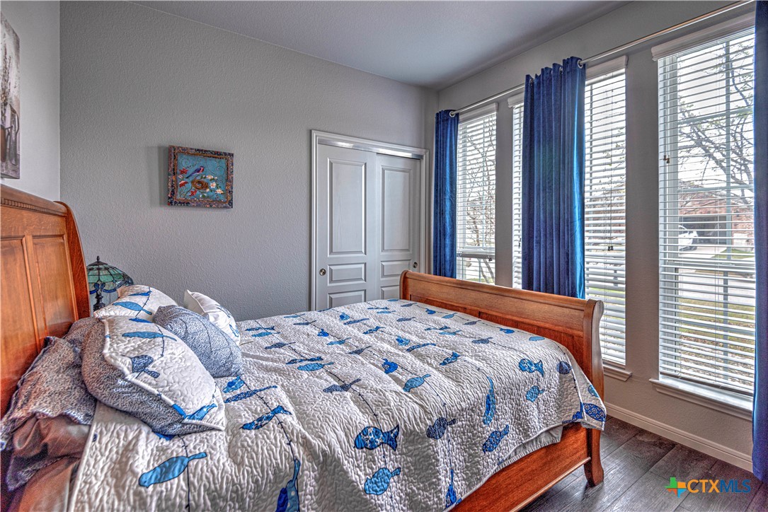 504 Coventry Drive Temple, TX 76502 - Photo 29 of 30 a bedroom with a bed and a large window