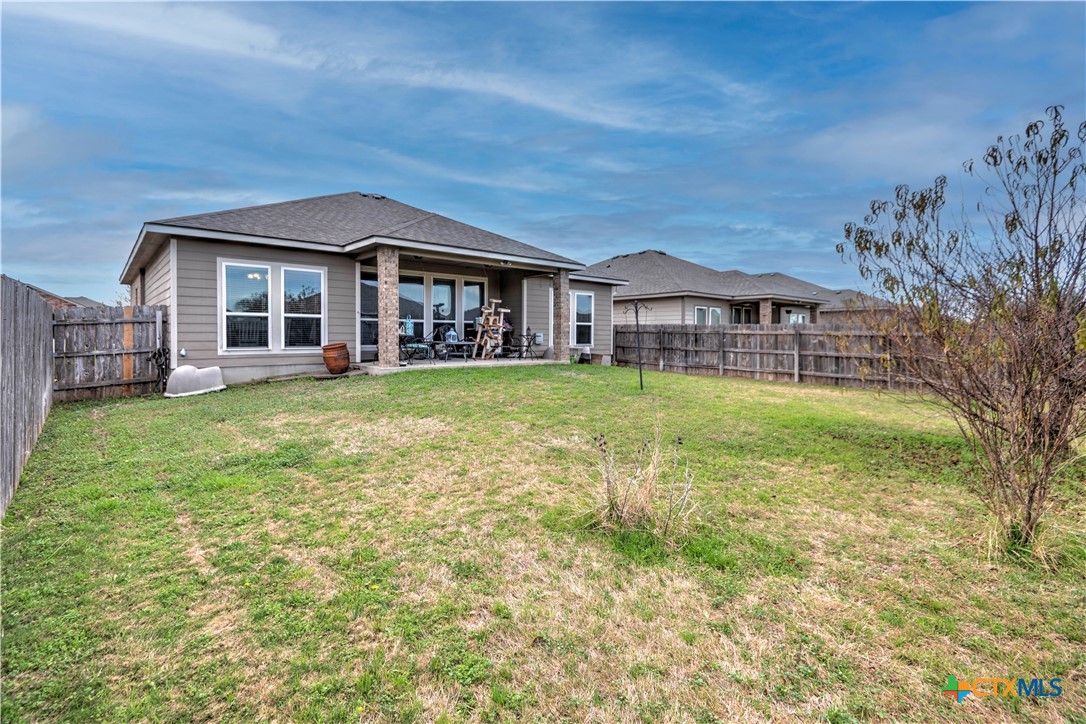 504 Coventry Drive Temple, TX 76502 - Photo 6 of 30 a view of a house with a big yard and large trees