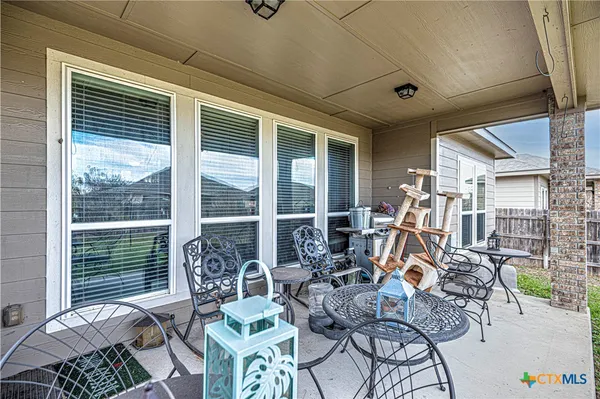 a livingroom with furniture water view and a window