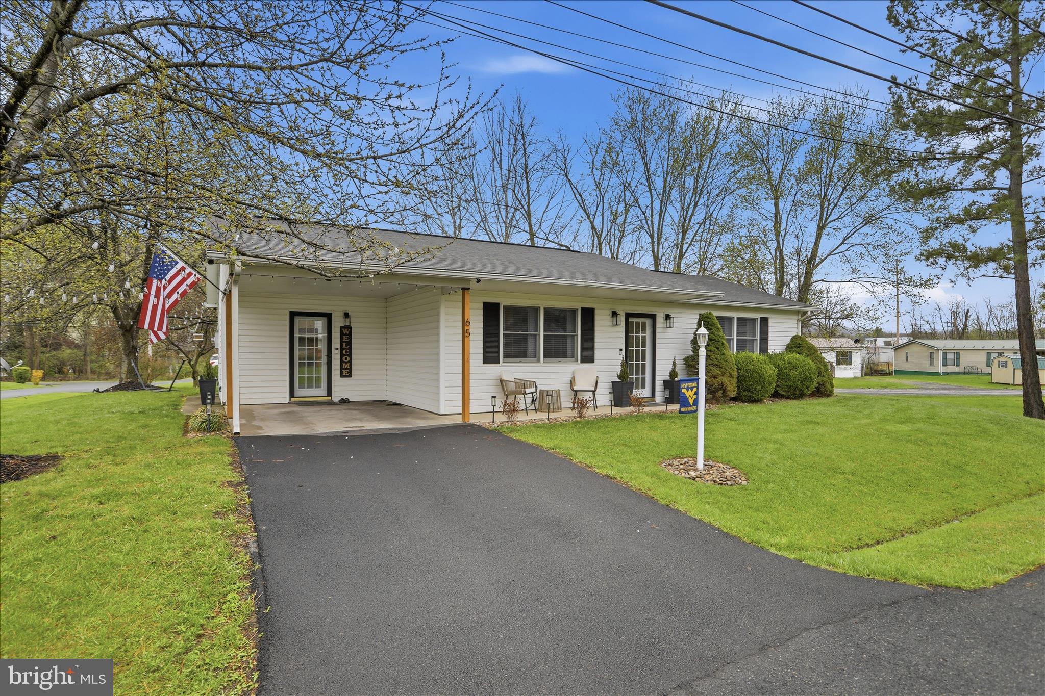 65 South Hummingbird Street Keyser, WV 26726 - Photo 2 of 30 a view of a house with a backyard