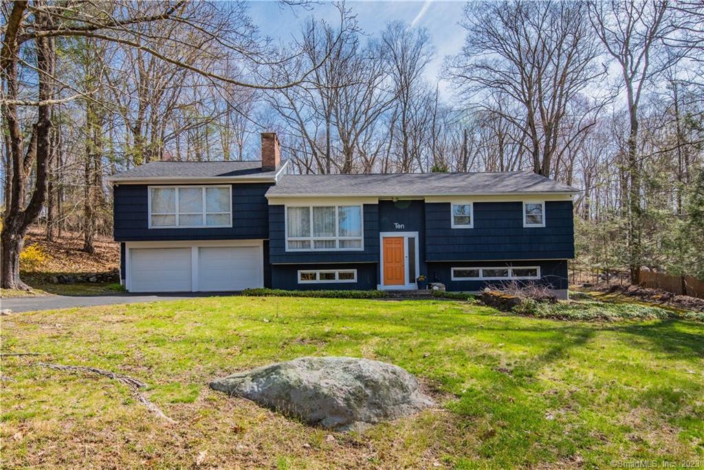 10 Pepperidge Road Newtown, CT 06470 - Photo 1 of 1 a view of a house with pool and a yard