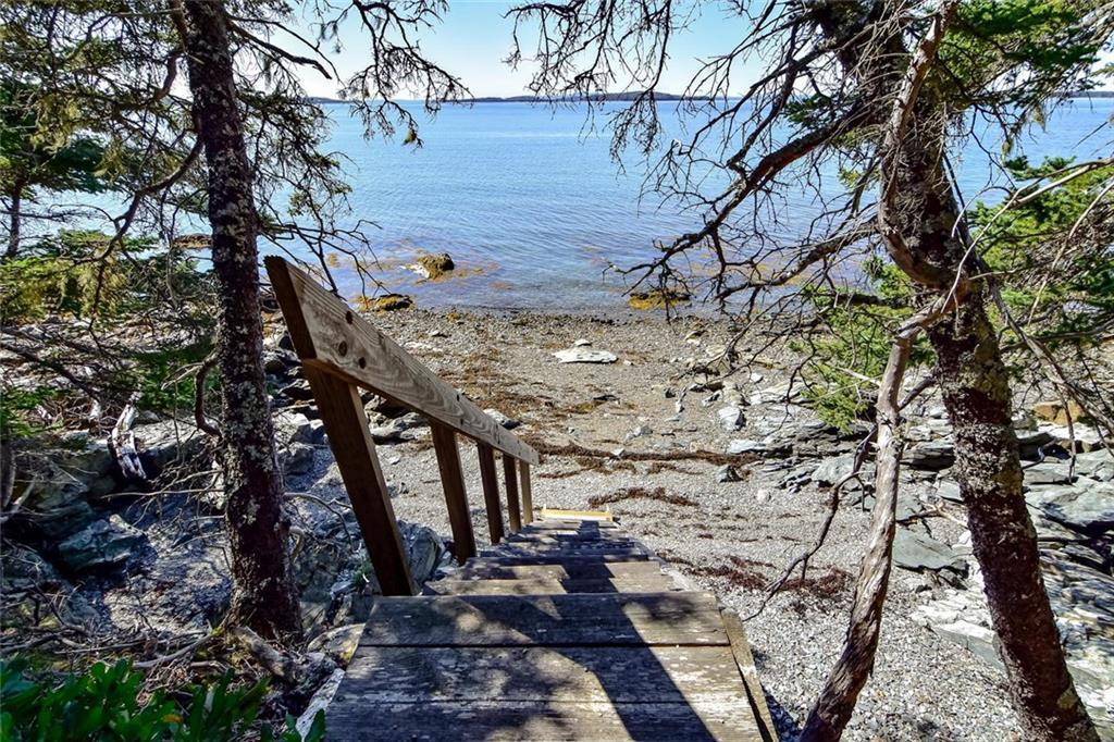 240 Dow Road Deer Isle, ME 04627 - Photo 11 of 34 Stairs to beach/kayak area