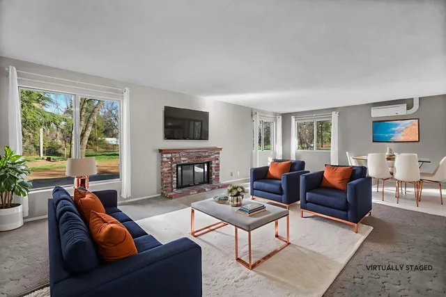 a view of kitchen with furniture and wooden floor
