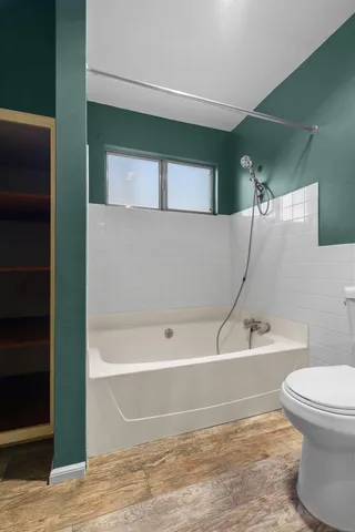 a view of a park with large trees