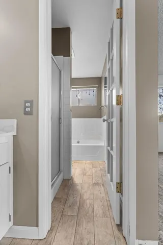 a view of a park with large trees