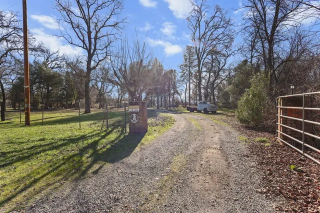 a view of a town with mountains in the background
