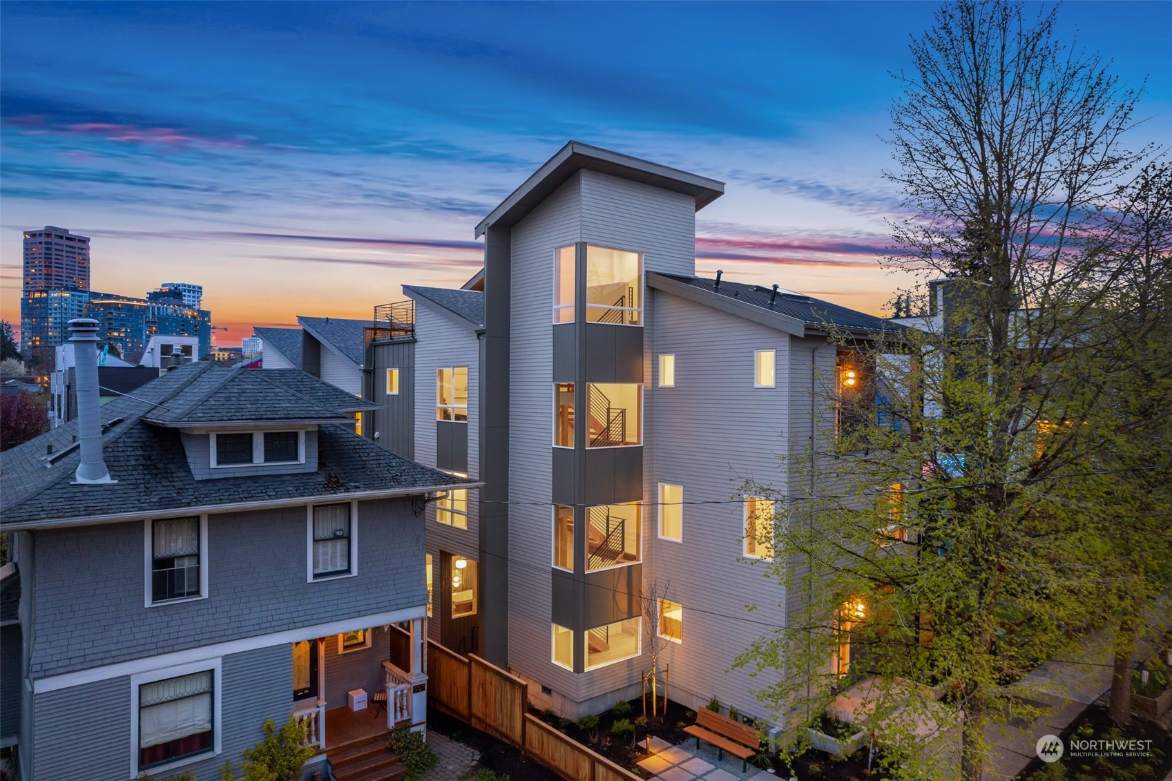 911 14th Avenue, Unit A Seattle, WA 98122 - Photo 1 of 33 a front view of a building with a yard
