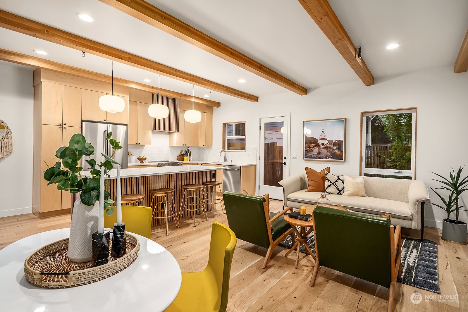 911 14th Avenue, Unit A Seattle, WA 98122 - Photo 12 of 33 a living room with fireplace furniture and a large window