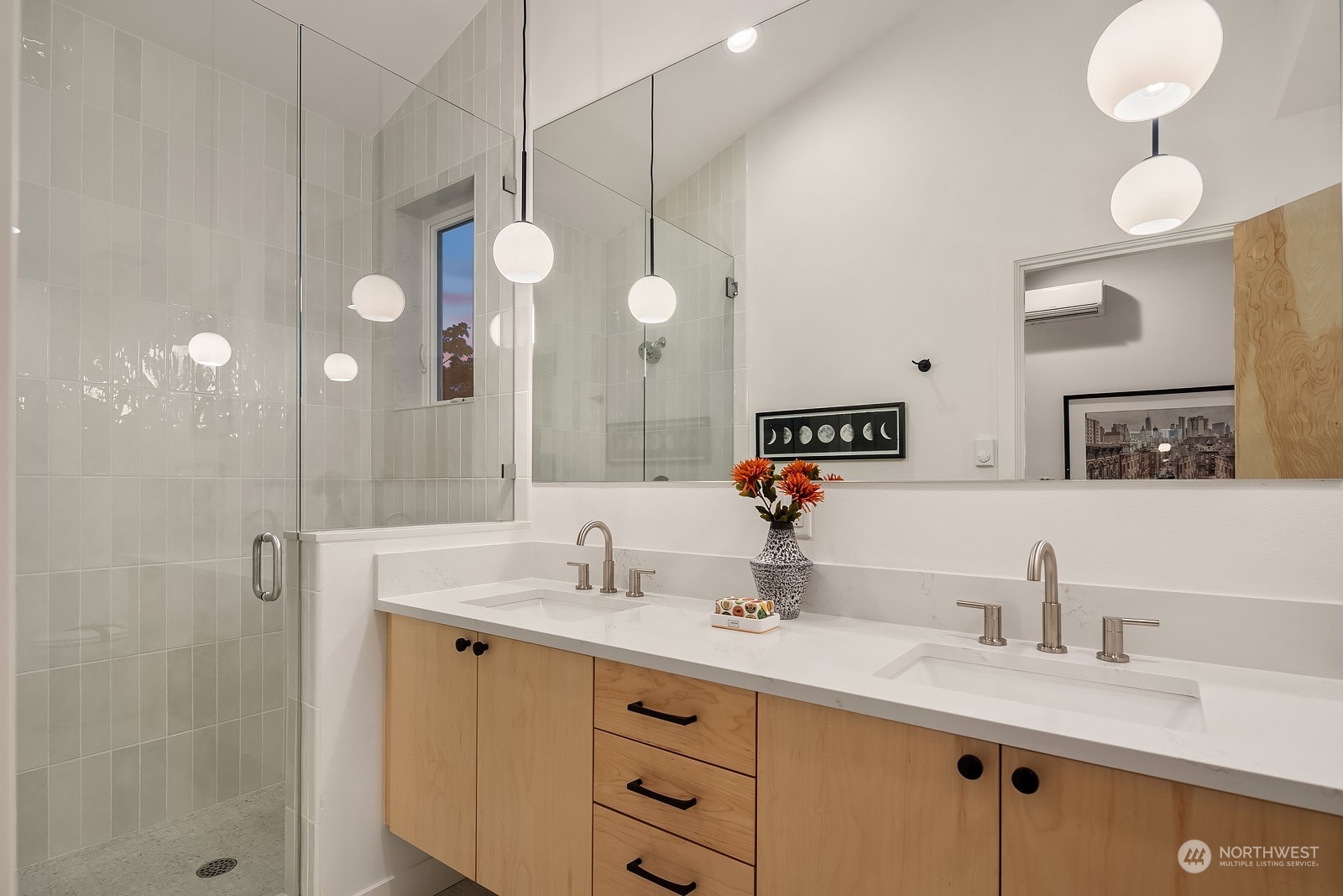 911 14th Avenue, Unit A Seattle, WA 98122 - Photo 18 of 33 a bathroom with a sink vanity and a mirror