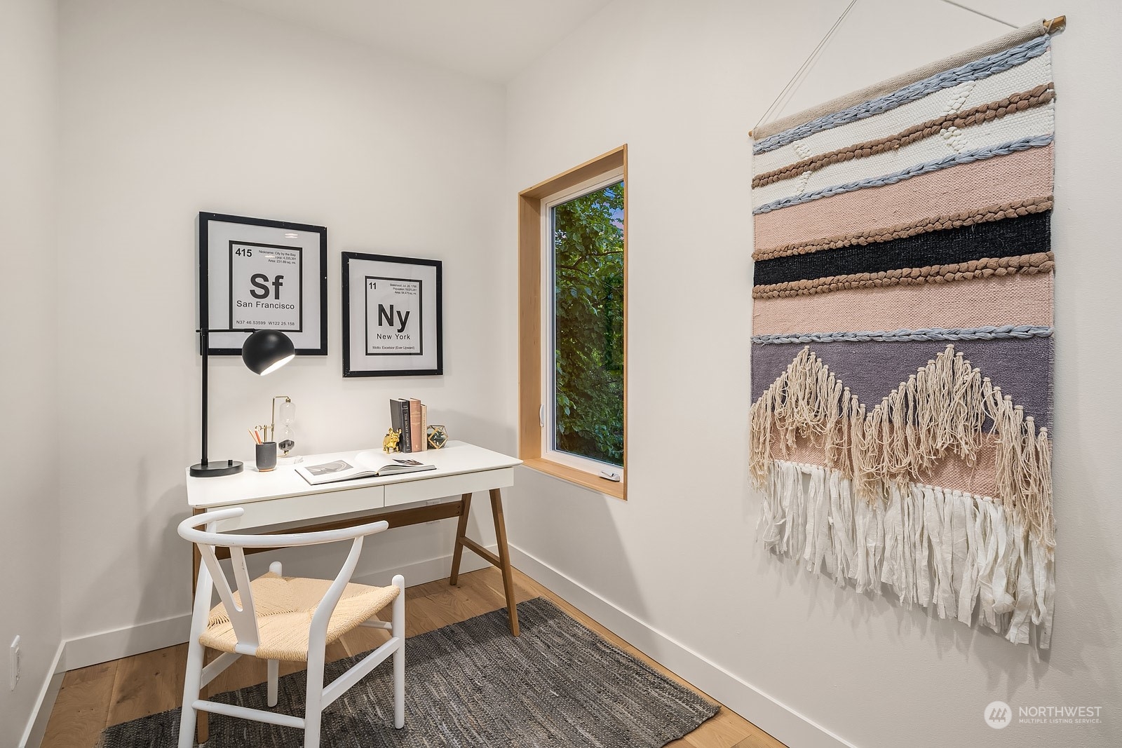 911 14th Avenue, Unit A Seattle, WA 98122 - Photo 22 of 33 a dining room with a wooden table and chairs