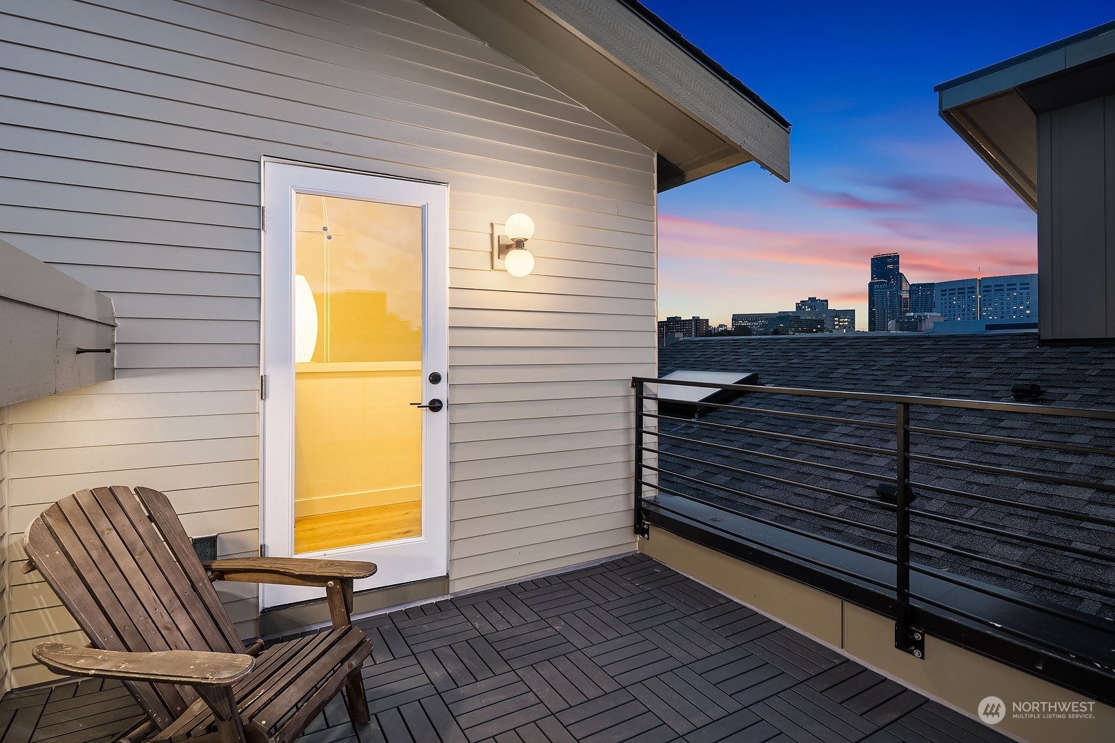 911 14th Avenue, Unit A Seattle, WA 98122 - Photo 26 of 33 a view of a terrace with wooden cabinets