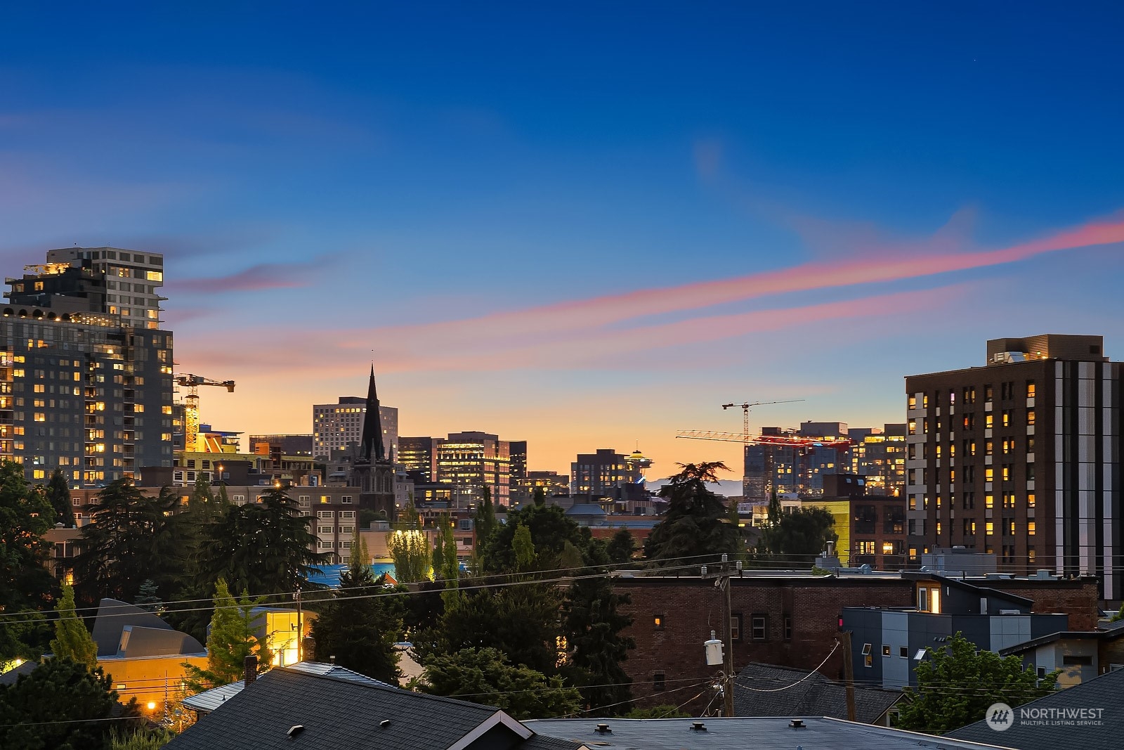 911 14th Avenue, Unit A Seattle, WA 98122 - Photo 30 of 33 a city view with tall buildings