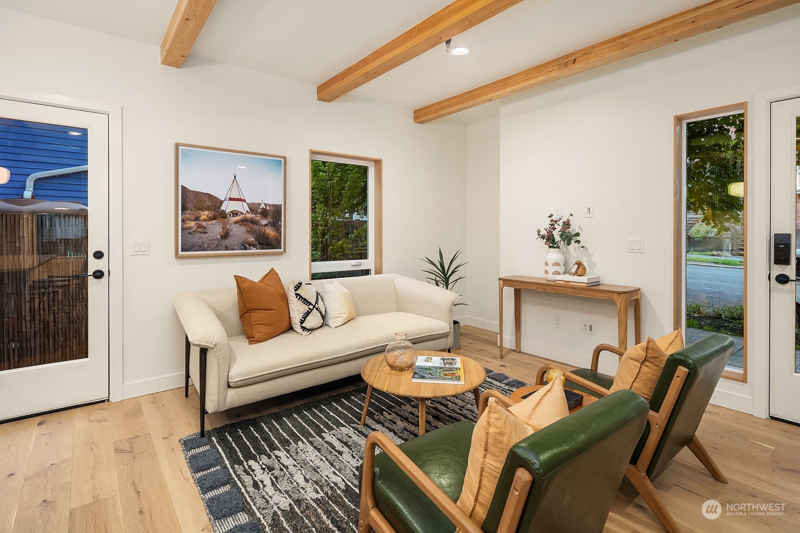 911 14th Avenue, Unit A Seattle, WA 98122 - Photo 10 of 33 a living room with furniture and a window