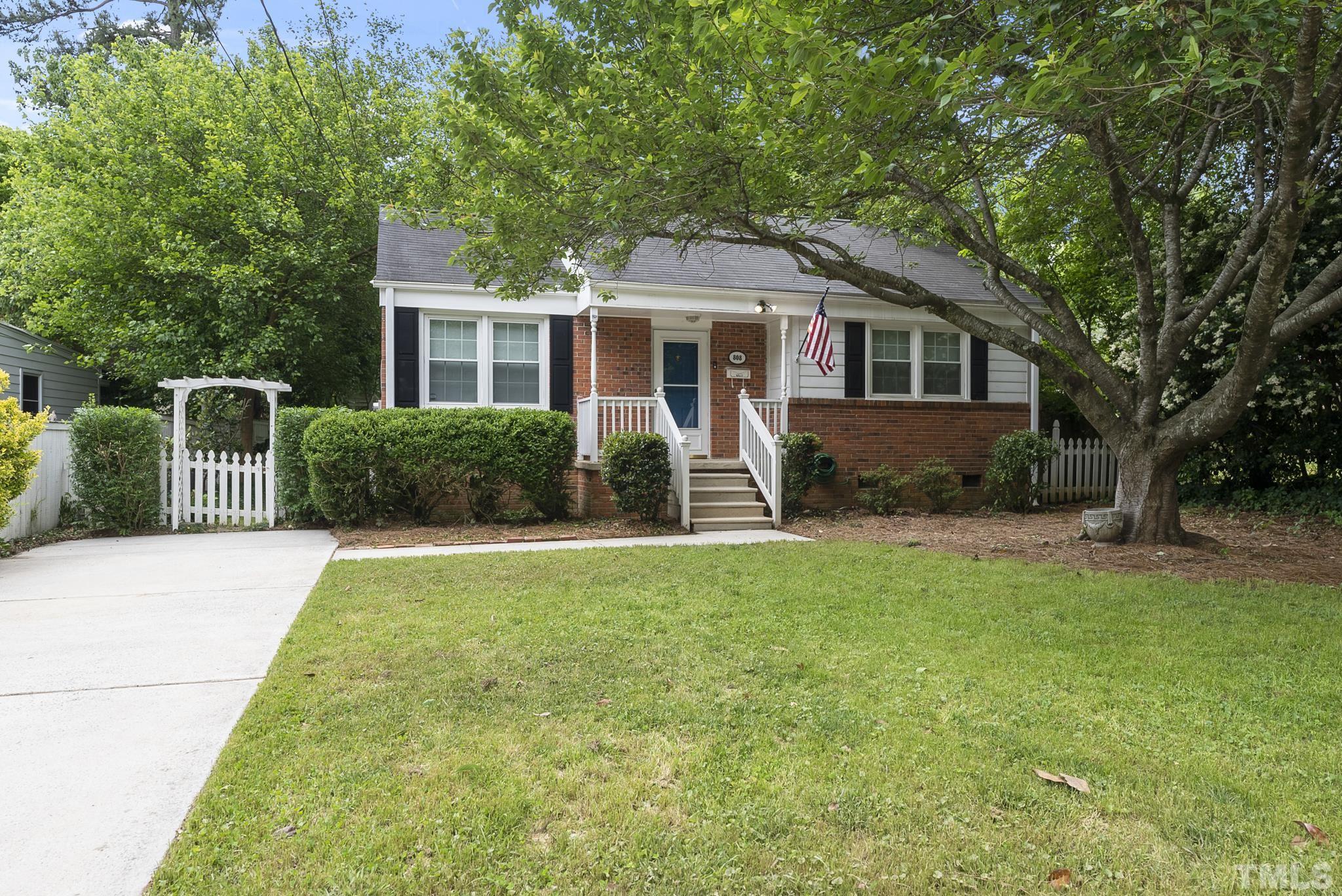 808 Young Street Raleigh, NC 27608 - Photo 2 of 26 a front view of house with yard and green space