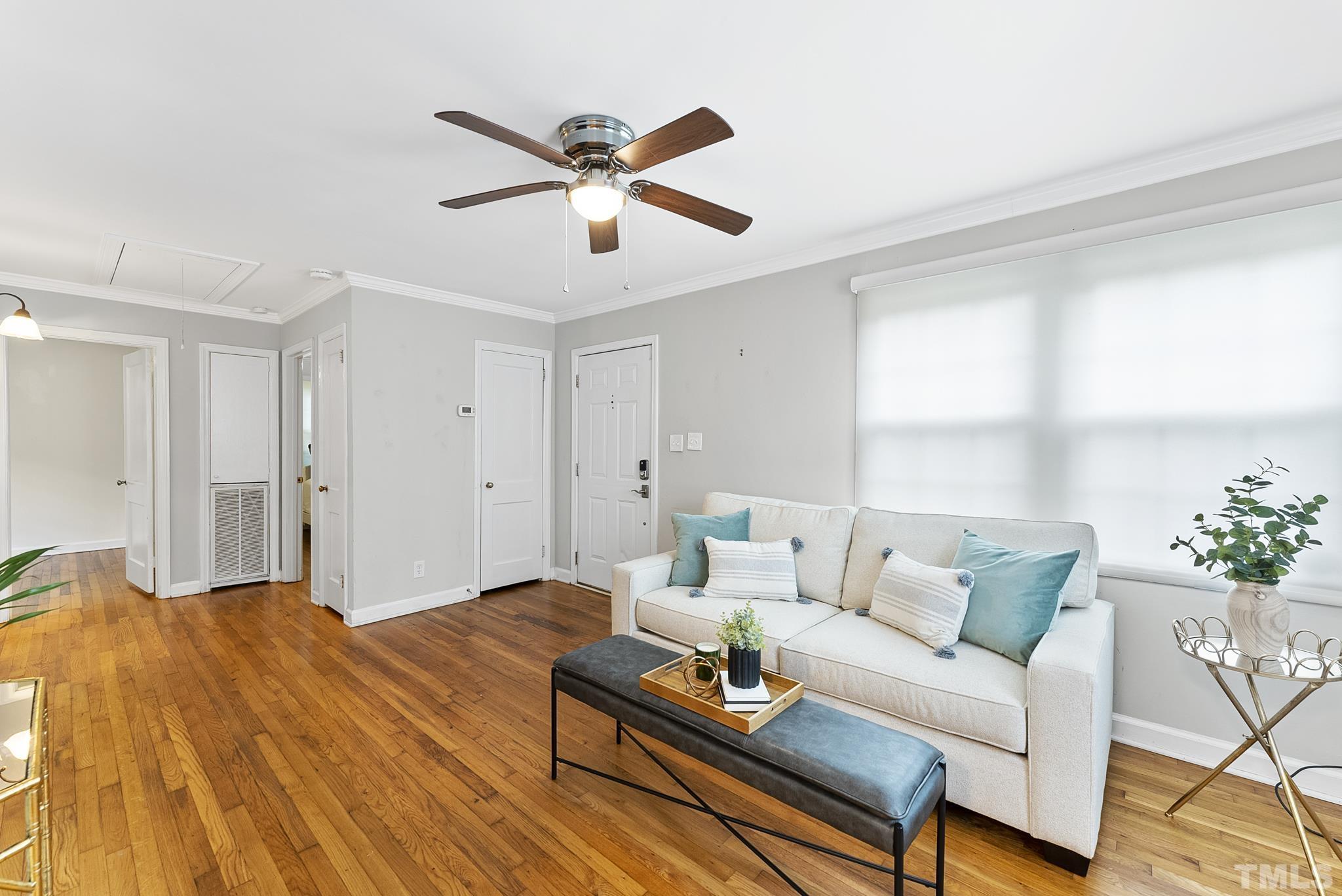 808 Young Street Raleigh, NC 27608 - Photo 5 of 26 a living room with furniture and window