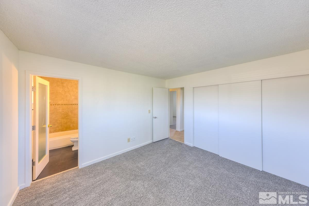3504 Sun Cloud Circle Reno, NV 89506 - Photo 11 of 26 an empty room with windows