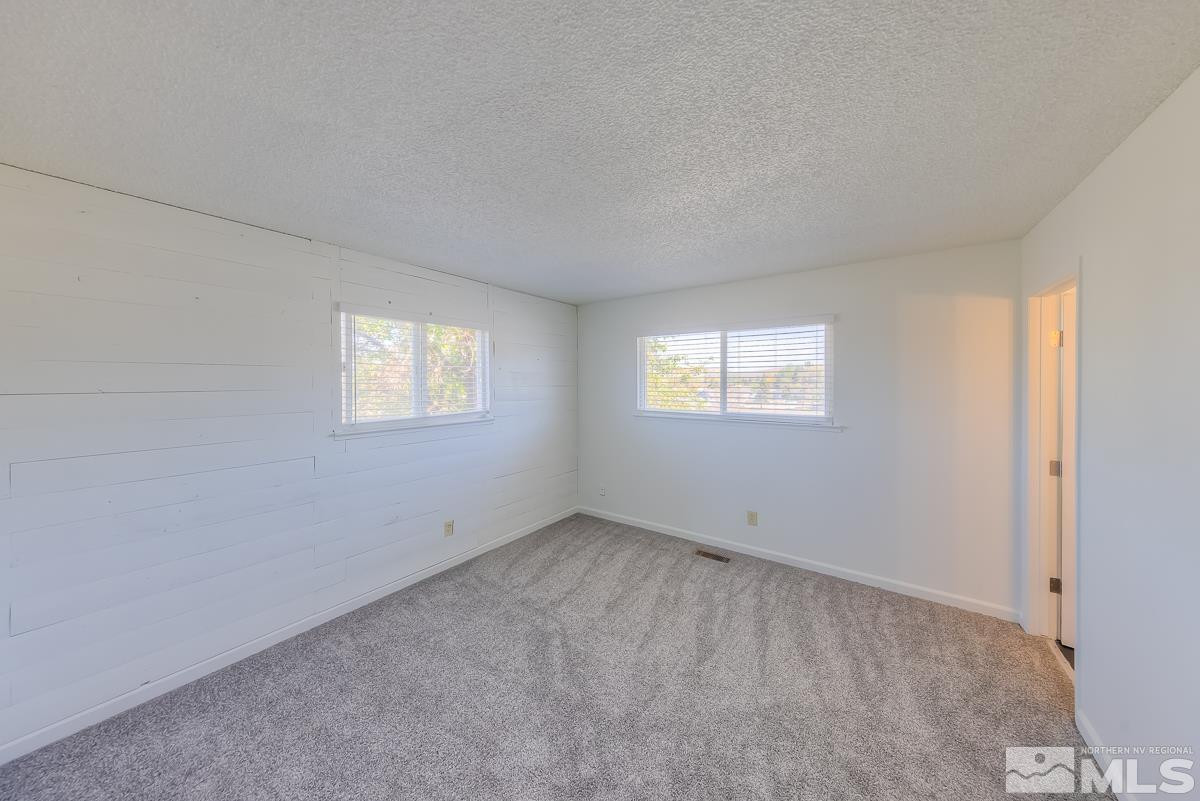 3504 Sun Cloud Circle Reno, NV 89506 - Photo 13 of 26 a view of an empty room with a window