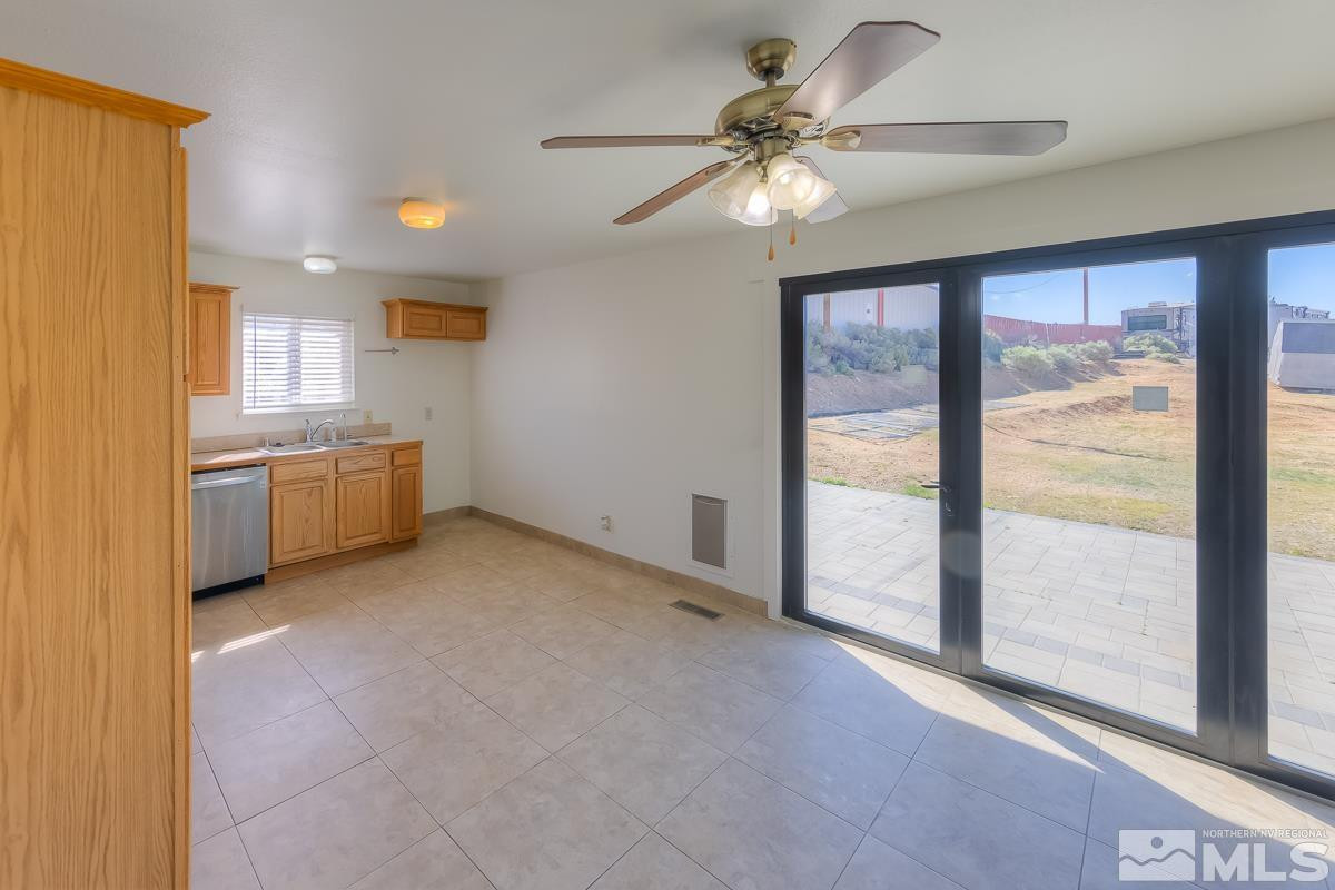 3504 Sun Cloud Circle Reno, NV 89506 - Photo 10 of 26 a view of a kitchen with a sink and cabinet area