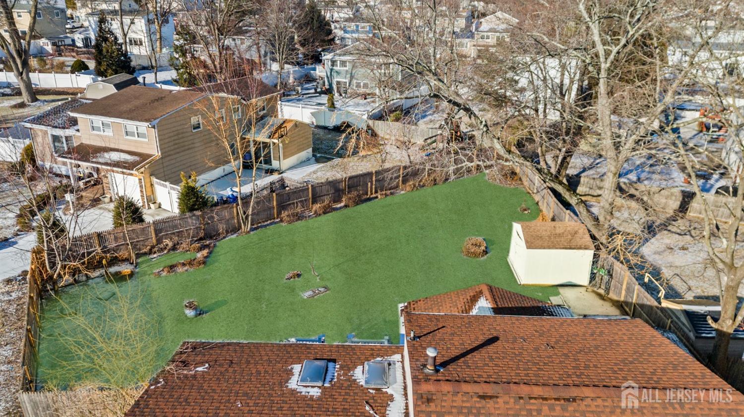 9 Piedmont Drive Old Bridge, NJ 08857 - Photo 2 of 40 an aerial view of a house with a yard